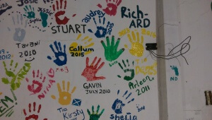 Here is the hand prints of all the uncles. The one on the right that is still wet is mine.